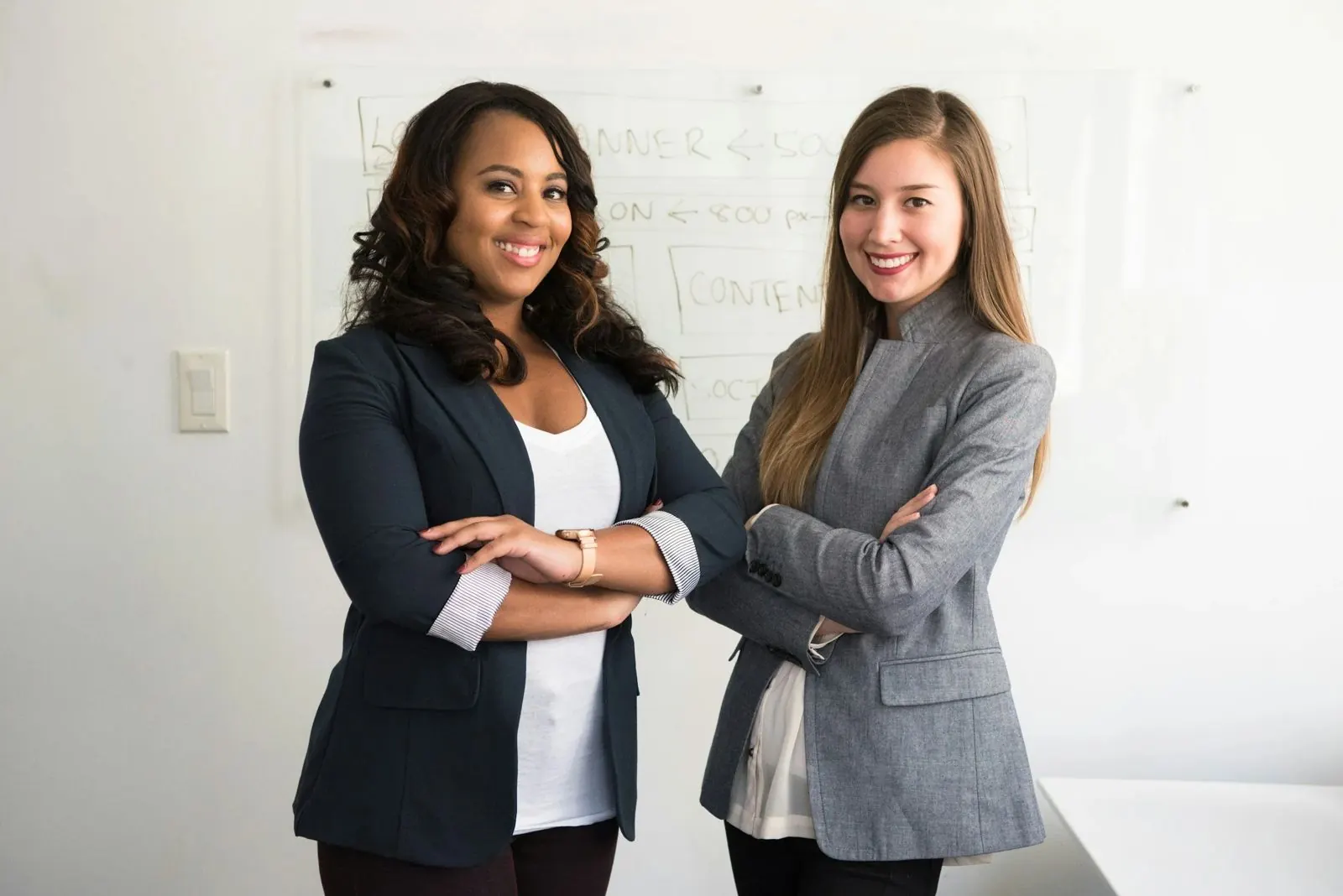 Business owner and advisor shaking hands after a payroll setup meeting